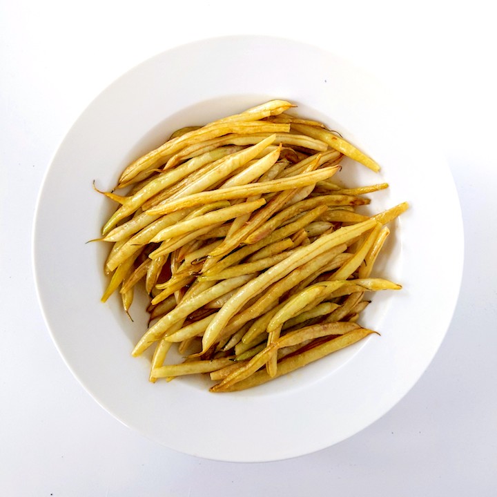 Wax beans (butter beans) on a white plate